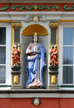 Carved from a statue of Mary with a crown.