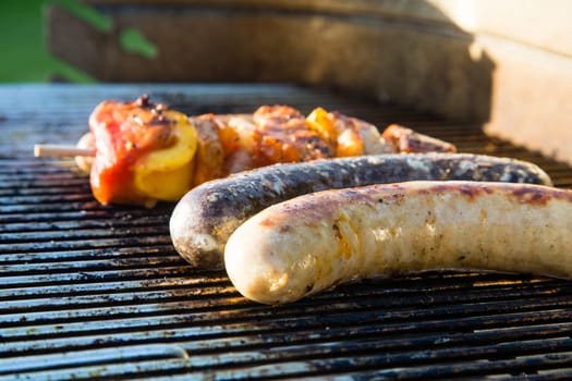 Grilled meat on a summer barbecue in the garden