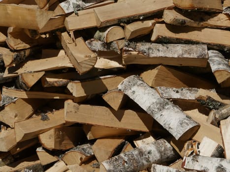 chopped birch firewood, heap, background