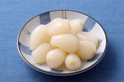 Japanese Rakkyo, Sweet and sour pickled scallions in a dish