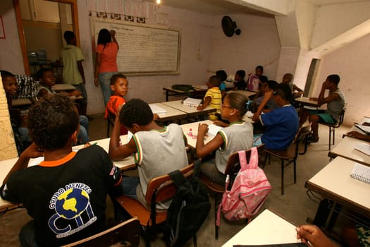 ilheus, bahia / brazil - march 19, 2012: students are seen in the classroom of a public school in the city of Ilheus, in the south of Bahia.