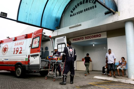 itabuna, bahia / brazil - august 24, 2011: member of the Mobile Emergency Care Service - Samu 192 - transport a patient to the Base Hospital in the city of Itabuna.