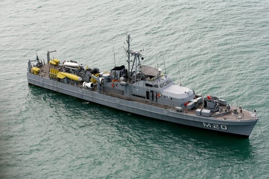 porto seguro, bahia / brazil - february 8, 2011: NV Albardao (M-20) class sweeper ship Aratu, from the Brazilian Navy is seen at sea in the city of Porto Seguro......