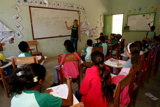 vitoria da conquist, bahia / brazil - october 31, 2011: professors and students are seen in a public school classroom in the city of Vitoria da Conquista.