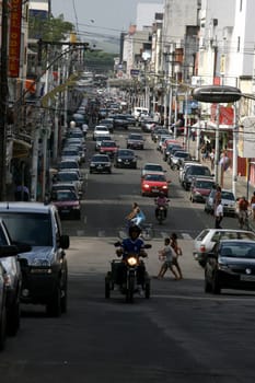 itabuna, bahia / brazil - january 2, 2012: vehicles are seen on the avenue Cinquentenario in the center of Itabuna, southern Bahia.