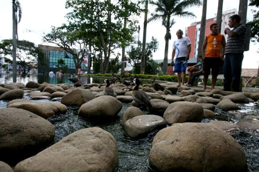vitoria da conquist, bahia / brazil - october 28, 2011: people are seen by the lake in Tancredo Neves square in the city of Vitoria da Conquista..