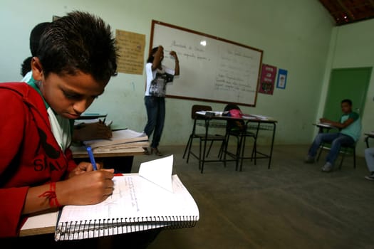 vitoria da conquist, bahia / brazil - october 31, 2011: professors and students are seen in a public school classroom in the city of Vitoria da Conquista.