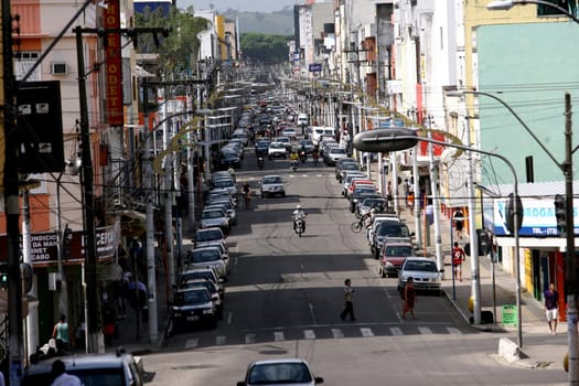 itabuna, bahia / brazil - january 2, 2012: vehicles are seen on the avenue Cinquentenario in the center of Itabuna, southern Bahia.