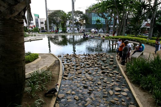 vitoria da conquist, bahia / brazil - october 28, 2011: people are seen by the lake in Tancredo Neves square in the city of Vitoria da Conquista..