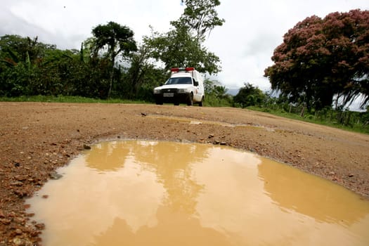 itabuna, bahia / brazil - november 22, 2011: mud and burco are seen on a dirt road leading to the district of Itamaraca, in the municipality of Itabuna, in southern Bahia......