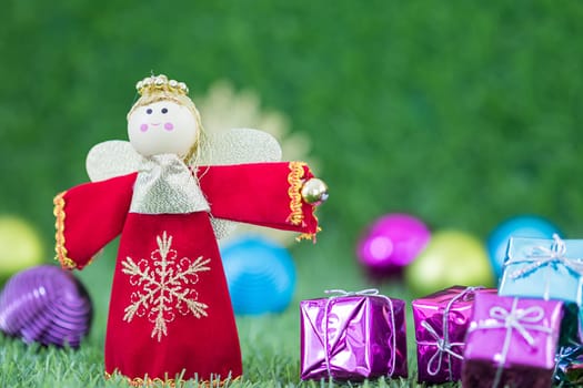 Celebration of New year and Christmas,Close up Christmas decoration on green grass background with copy space