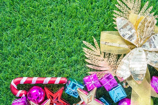 Celebration of New year and Christmas, Top view Christmas decoration on green grass background