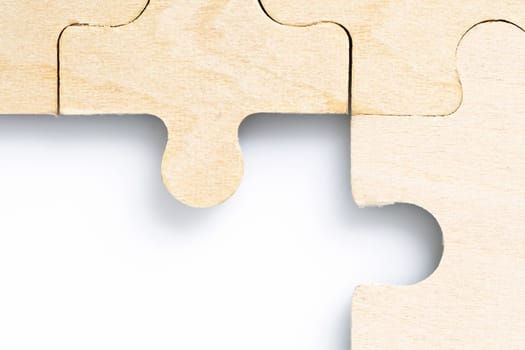 Close up shot of Missing jigsaw puzzle pieces on white background,business concept