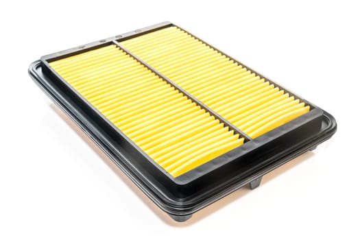 Close up new square car air filter on a white background