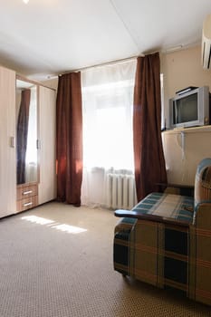 Fragment of the interior of an old apartment with a poor interior