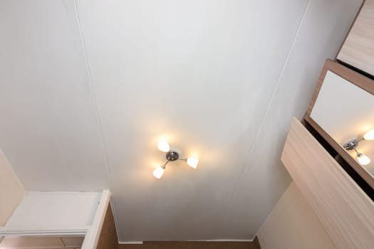 Old plaster whitewashed ceiling in the apartment