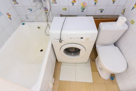Anapa, Russia - June 25, 2020: The interior of a small old combined bathroom