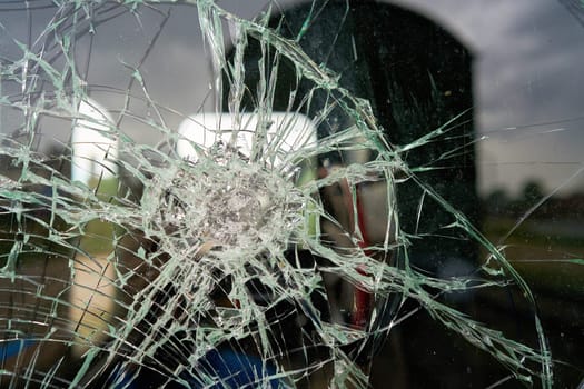 destroyed glass of the window pane of a railway wagon