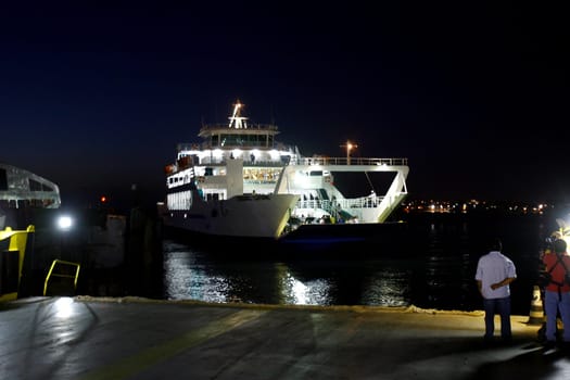 salvador, bahia / brazil - october 1, 2014: passengers disembark from the Dorival Caymmi Ferry Boat, a vessel that crosses the Baía de Todos os Santos from Salvador to Ilha de Itaparica..