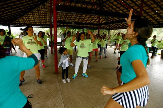 salvador, bahia / brazil - october 4, 2014: people are seen doing aerobics during gym activity at Pituacu Park in the city of Salvador....