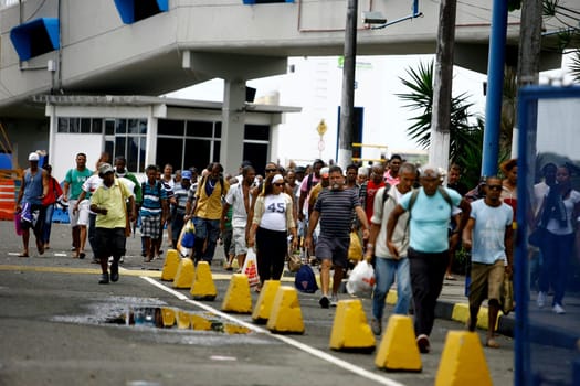 salvador, bahia / brazil - october 3, 2014: passengers disembark at the Terminal de Sao Joaquim in Salvador, after crossing the Baía de Todos os Santos on the island of Itaparica.