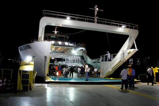 salvador, bahia / brazil - october 1, 2014: passengers disembark from the Dorival Caymmi Ferry Boat, a vessel that crosses the Baía de Todos os Santos from Salvador to Ilha de Itaparica..