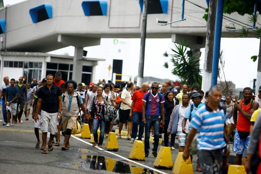 salvador, bahia / brazil - october 3, 2014: passengers disembark at the Terminal de Sao Joaquim in Salvador, after crossing the Baía de Todos os Santos on the island of Itaparica.
