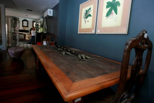 salvador, bahia / brazil - december 26, 2014: house decorated with demolition wooden table. environment on display in a store in the city of Salvador.