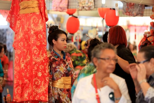 salvador, bahia / brazil - august 27, 2016: people are seen in store stand during japanese culture party at Parque de Exposicoes in the city of Salvador.