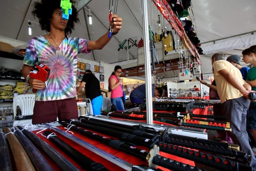 salvador, bahia / brazil - august 27, 2016: people are seen in store stand during japanese culture party at Parque de Exposicoes in the city of Salvador.