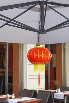 Traditional red chinese lantern in oriental restaurant