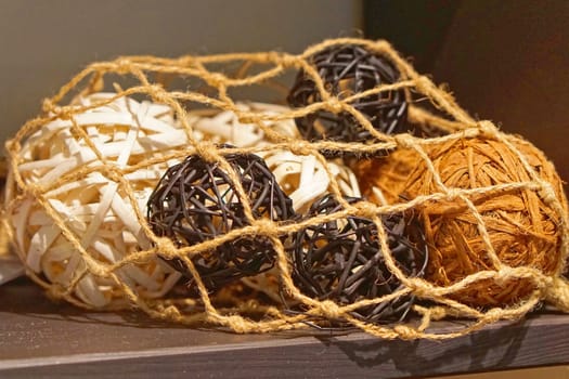 Decorative wicker rattan balls in rope net