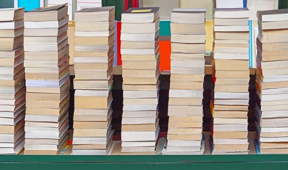 Big pile of books at flea market stall