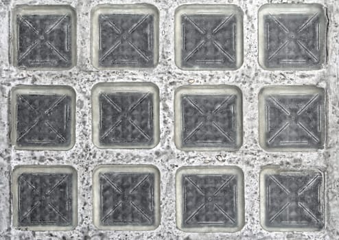 Clear glass blocks in floor pavement