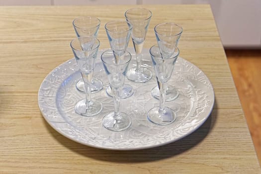 Six shot spirit drinks glasses at tray