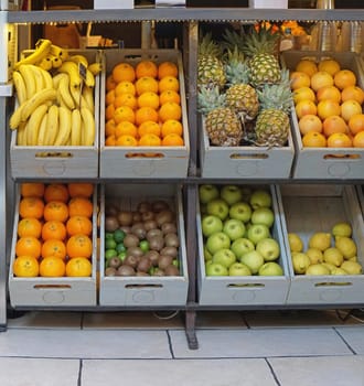 Crates with fresh fruits in juice bar