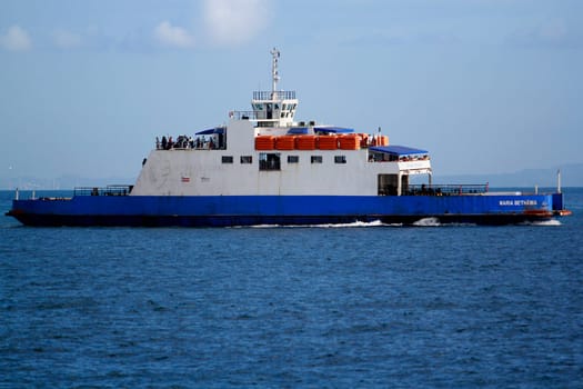 salvador, bahia / brazil - november 3, 2014: Rio Paraguacu ferry boat is seen sailing through Baia de Todos os Santos during crossing from Itaparica Island to the city of Salvador.
