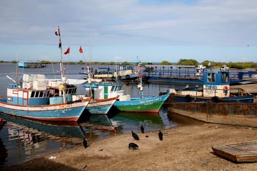 santa cruz cabralia, bahia / brazil - january 14, 2008: fishing boats are seen in port in the city of Santa Cruz Cabralia.