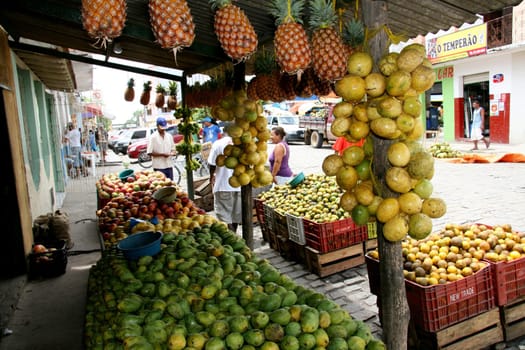 eunapolis, bahia / brazil - december 29, 2007: fruits are seen for sale at an open market in the city of Eunapolis.......