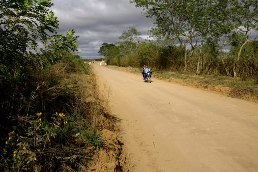 vitoria da conquista, bahia / brazil - october 28, 2011: dirt road connecting the district of Igua to the city center of Vitoria da Conquista.