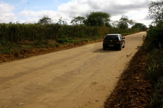 vitoria da conquista, bahia / brazil - october 28, 2011: dirt road connecting the district of Igua to the city center of Vitoria da Conquista.