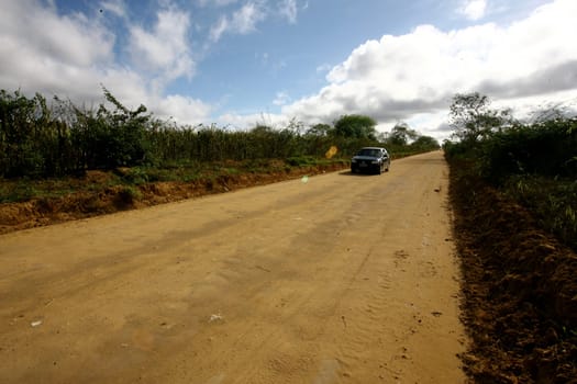 vitoria da conquista, bahia / brazil - october 28, 2011: dirt road connecting the district of Igua to the city center of Vitoria da Conquista.