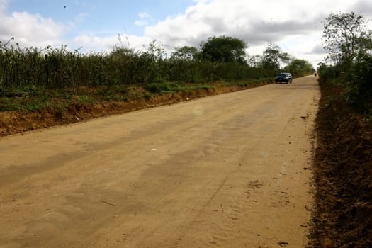 vitoria da conquista, bahia / brazil - october 28, 2011: dirt road connecting the district of Igua to the city center of Vitoria da Conquista.