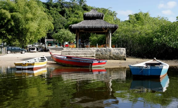 porto seguro, bahia / brazil - february 26, 2011: Boats are seen in the Rio Caraiva district of the city of Porto Seguro, in southern Bahia.