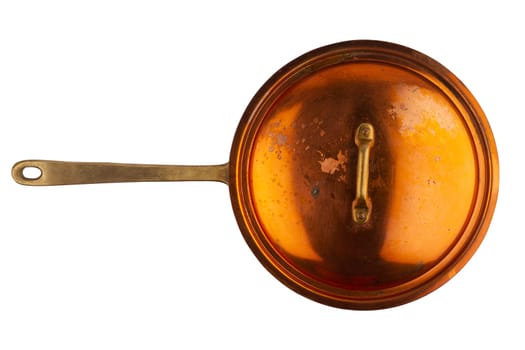 top view closeup of old cooking pan with copper lid and metallic handle isolated on white background