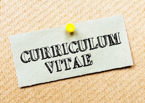 Recycled paper note pinned on cork board.Curriculum Vitae Message. Concept Image