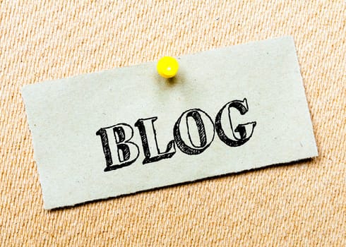 Recycled paper note pinned on cork board. Blog message. Concept Image