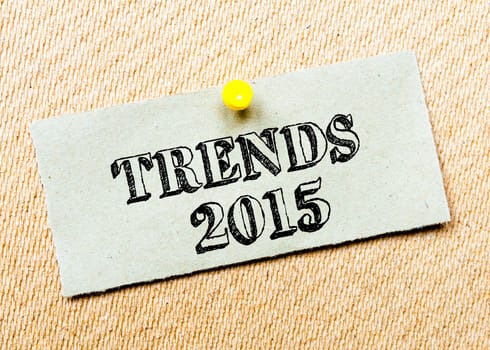 Recycled paper note pinned on cork board.Trends 2015 Message. Concept Image