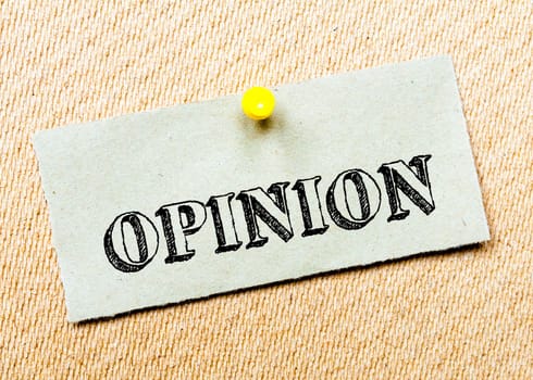 Recycled paper note pinned on cork board. Opinion Message. Concept Image