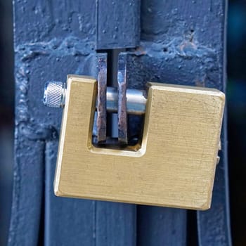 Strong Brass Padlock at door